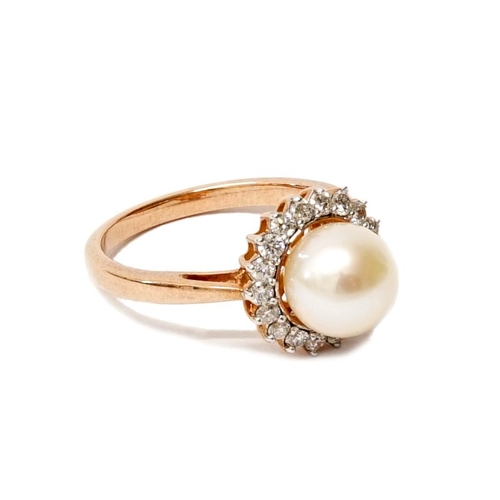 124 - A 9ct rose gold pearl and diamond ring size N - approx diamond weight 0.37ct