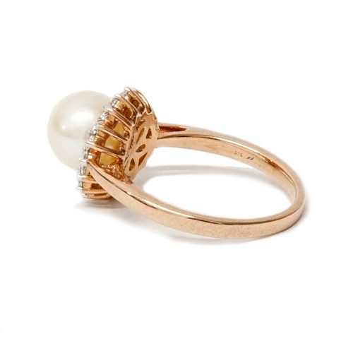 124 - A 9ct rose gold pearl and diamond ring size N - approx diamond weight 0.37ct