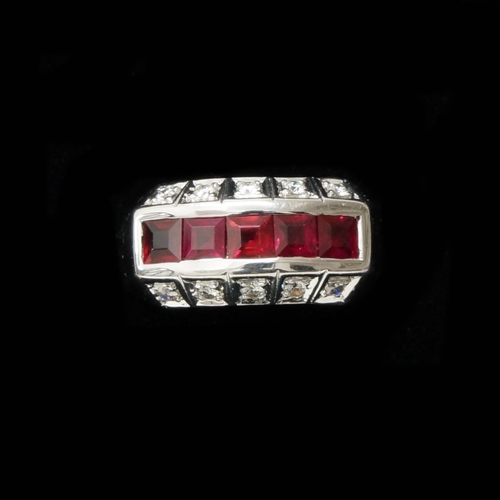 126 - A handmade 18ct white gold Art Deco style ring (10.1g) channel set with princess cut rubies, with ro... 