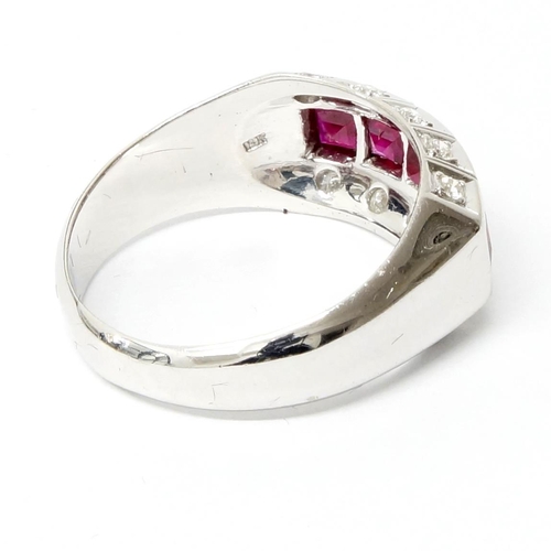 126 - A handmade 18ct white gold Art Deco style ring (10.1g) channel set with princess cut rubies, with ro... 