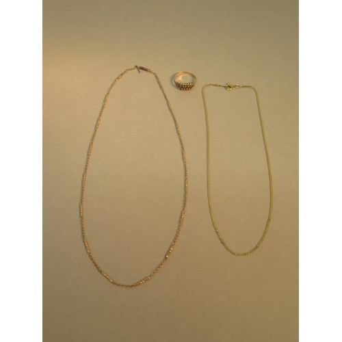 135 - 9ct gold - A hallmarked ring, a hallmarked gold chain and a rose gold chain (tested) - total weight ... 