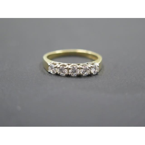 140 - A good 18ct yellow gold five stone diamond ring - five even round brilliant cut diamonds - approx 0.... 