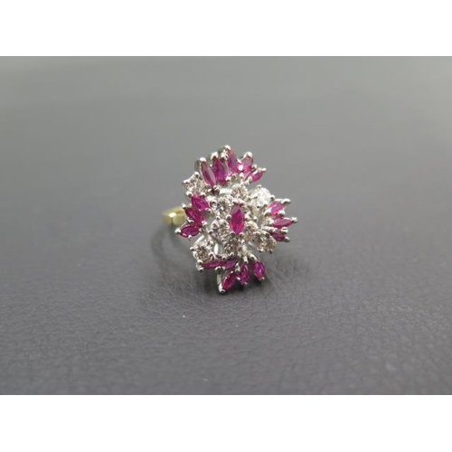 141 - A striking diamond and ruby cluster ring in 18ct yellow gold and platinum - ring size N - weight app... 