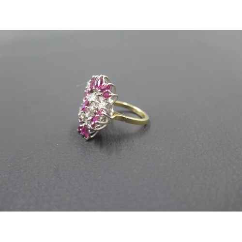 141 - A striking diamond and ruby cluster ring in 18ct yellow gold and platinum - ring size N - weight app... 