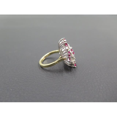 141 - A striking diamond and ruby cluster ring in 18ct yellow gold and platinum - ring size N - weight app... 