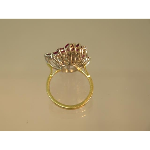 141 - A striking diamond and ruby cluster ring in 18ct yellow gold and platinum - ring size N - weight app... 