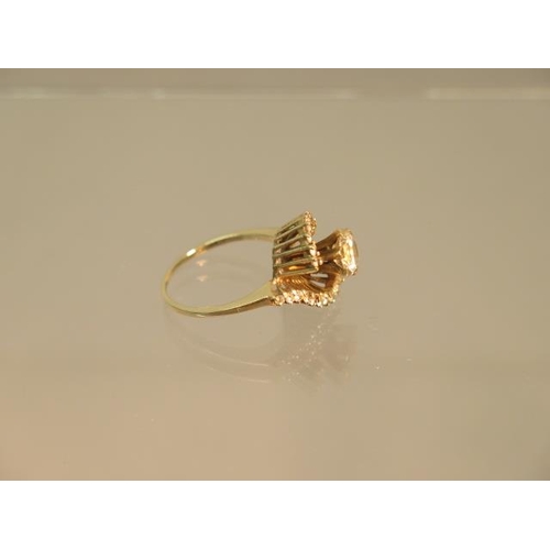 148 - A 9ct yellow gold (hallmarked) dress ring with white stones - ring size M/N - weight approx 3.6 gram... 