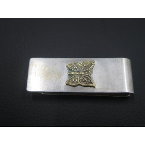 152 - A .925 silver money clip together with an .800 silver bracelet - total weight approx 1.7 troy oz