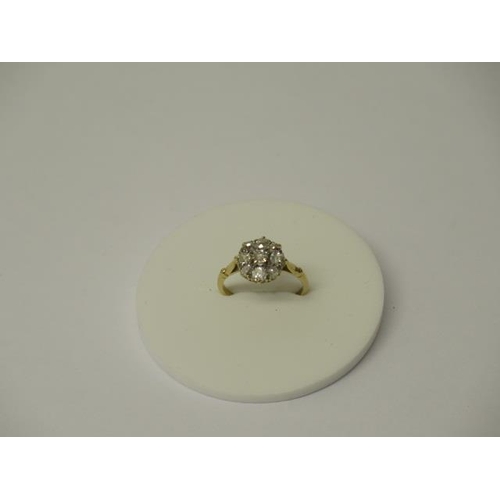 166 - An 18ct yellow gold (tested) and old cut diamond cluster ring size L/M - weight approx 2.4 grams