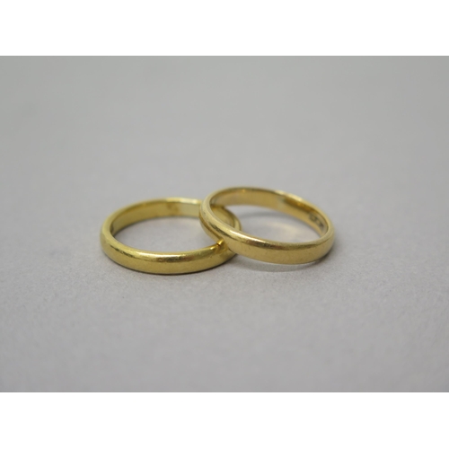 171 - Two 22ct yellow gold (hallmarked) wedding bands - sizes L & K - total weight approx 7 grams