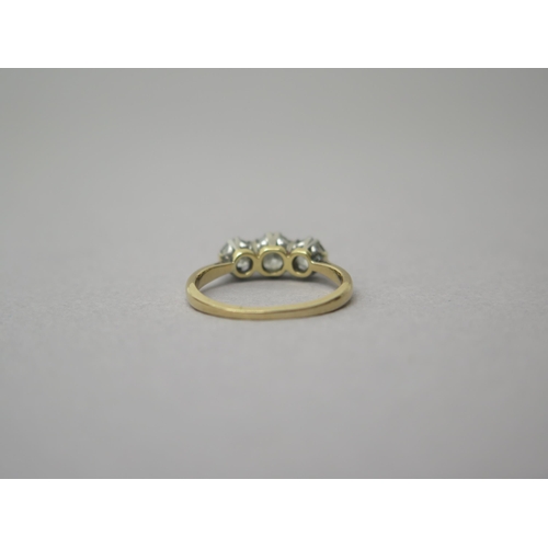 175 - An 18ct yellow gold (hallmarked) three stone diamond ring - central diamond approx 0.5ct - total dia... 