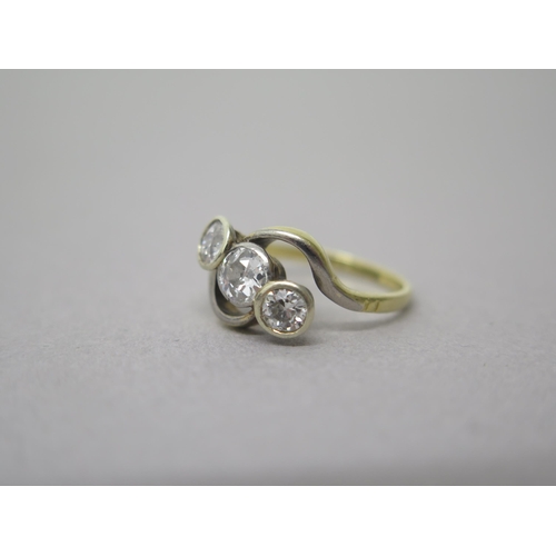 178 - An 18ct yellow gold (hallmarked) three stone diamond ring - central diamond approx 0.3ct - ring size... 