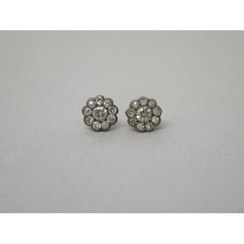 181 - A pair of yellow gold diamond cluster ear studs - approx 1cm diameter - central diamonds approx 0.25... 