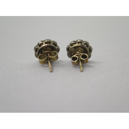 181 - A pair of yellow gold diamond cluster ear studs - approx 1cm diameter - central diamonds approx 0.25... 