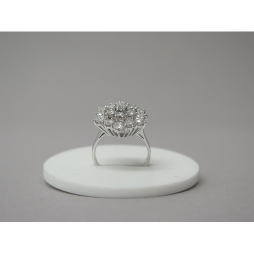 187 - A good quality 18ct white gold large diamond cluster ring - diamonds approx 2ct, diamonds are well m... 