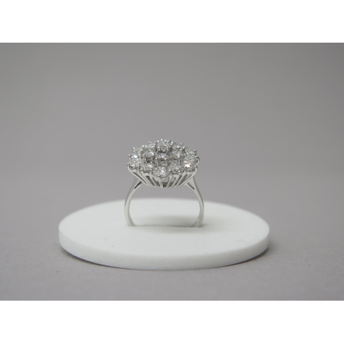 187 - A good quality 18ct white gold large diamond cluster ring - diamonds approx 2ct, diamonds are well m... 