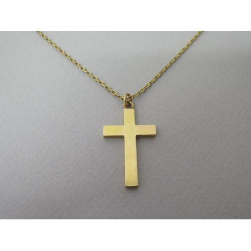 188 - An 18ct yellow gold (tested) cross pendant - approx 3.5cm - weight approx 8 grams with a 9ct yellow ... 