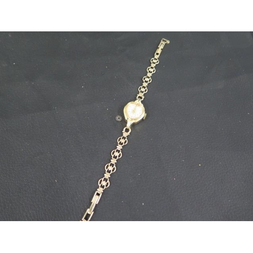 196 - A ladies dress watch with a 9ct gold bracelet - approx total weight 14.06 grams