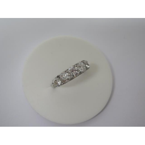 1A - A very good early 20th century diamond five stone ring set in carved platinum shank - five old mine ... 