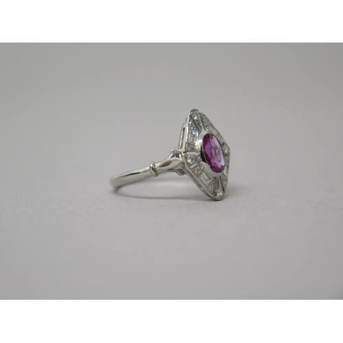 210 - An Art Deco style platinum pink oval sapphire and diamond ring - head size approx 16mm x 14mm - ring... 