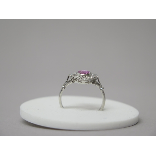 210 - An Art Deco style platinum pink oval sapphire and diamond ring - head size approx 16mm x 14mm - ring... 