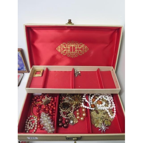 221 - Mixed costume jewellery in jewellery box with lock and key