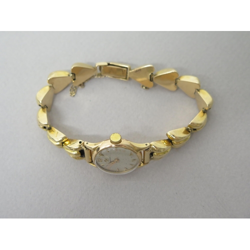 232 - A ladies Omega rose gold (hallmarked) cased watch with yellow gold (tested) bracelet - not currently... 