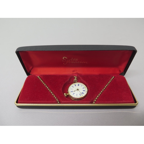 235 - A 14ct yellow gold (hallmarked) fob watch - case approx 27mm - with gold plated chain