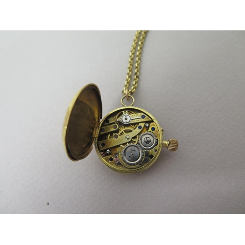 235 - A 14ct yellow gold (hallmarked) fob watch - case approx 27mm - with gold plated chain