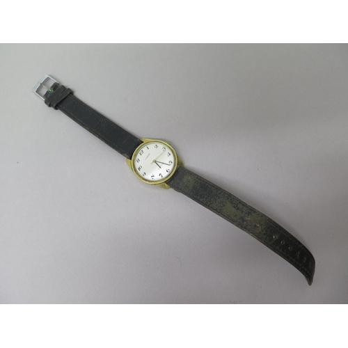 236 - A gents Tissot gold plated wristwatch - round case approx 33mm - working in the saleroom