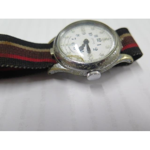 242 - A Smiths Brail wristwatch on a Military strap in working order in its original box