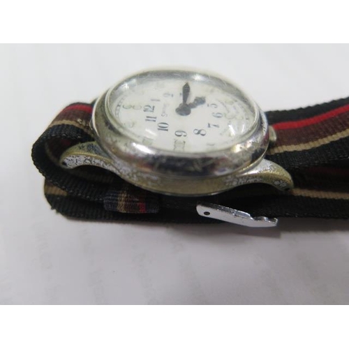 242 - A Smiths Brail wristwatch on a Military strap in working order in its original box