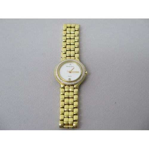 245A - A ladies Maurice Lacroh quartz gold plated bracelet watch - round case 25mm with mother of pearl dia... 