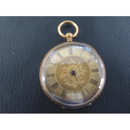 252 - An 18ct gold fob watch with a gold cavette - stamped 18K - approx weight 30 grams