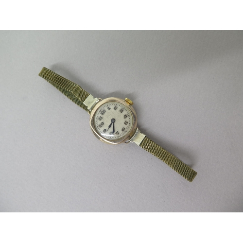 254A - A 1920's ladies 9ct gold cased wristwatch - 26cm - working in saleroom