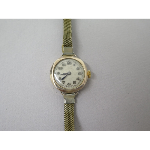 254A - A 1920's ladies 9ct gold cased wristwatch - 26cm - working in saleroom