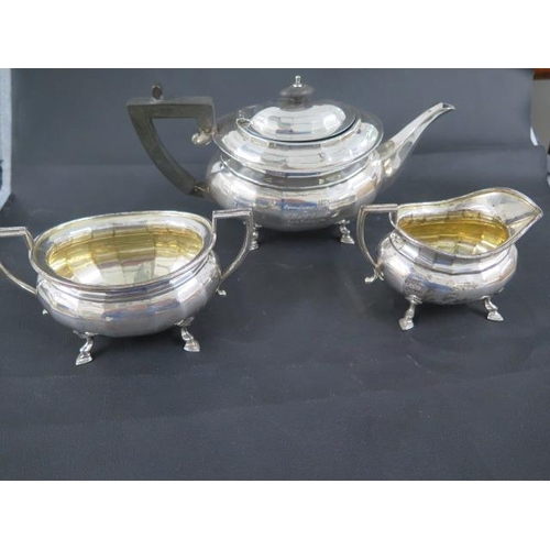 292 - A silver three piece set, Stevenson & Law, Sheffield 1921 - teapot approx 18cm and with Masonic lodg... 