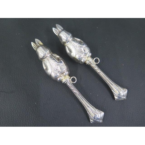 295 - A pair of charming sterling silver babies rattles modelled as rabbits S & Co Birmingham - approx 13c... 