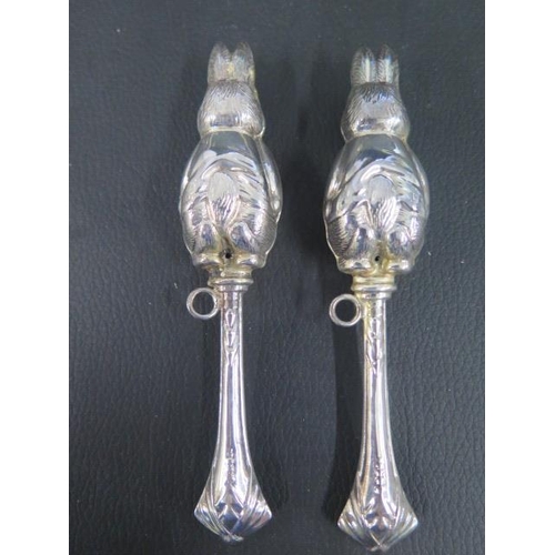 295 - A pair of charming sterling silver babies rattles modelled as rabbits S & Co Birmingham - approx 13c... 