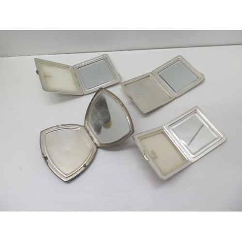 304A - Three silver powder compacts - approx 7cm x 7cm - with another