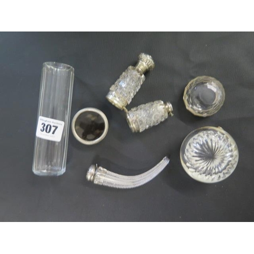 307 - Five pieces of silver topped cut glass including a cornucopia bottle and hinged double bottle