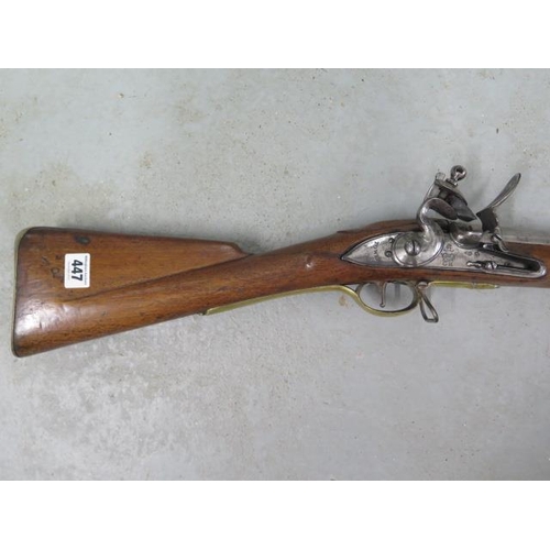 447 - A circa 1800 Brown Bess flintlock musket, tower proof - in good condition, the stock with a nice pat... 