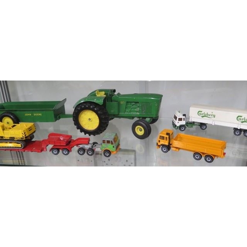 457 - Assorted Siku Toys - A John Deere tractor and trailer and a Corgi fork lift