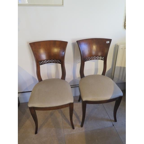 501 - A pair of yew wood Biedermeir single chairs - Height 91cm