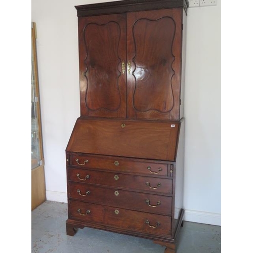 508 - A good quality early 19th century flame mahogany bureau bookcase with two doors above the base which... 