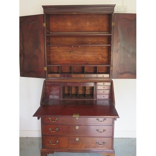 508 - A good quality early 19th century flame mahogany bureau bookcase with two doors above the base which... 