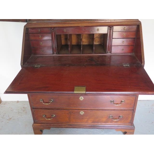 508 - A good quality early 19th century flame mahogany bureau bookcase with two doors above the base which... 