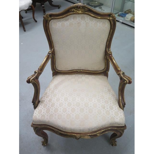 517 - A good quality gilt armchair with out swept arms, a serpentine front and cabriole legs - in nice con... 