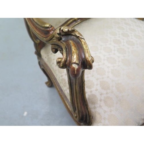 517 - A good quality gilt armchair with out swept arms, a serpentine front and cabriole legs - in nice con... 