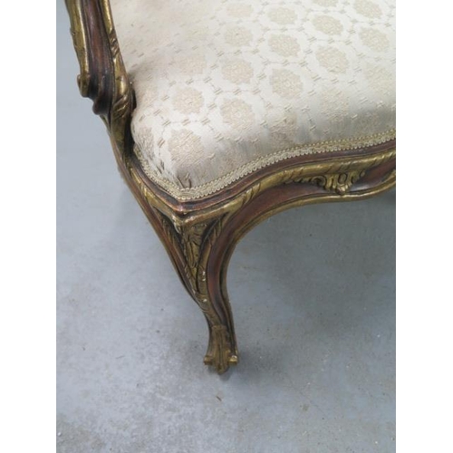 517 - A good quality gilt armchair with out swept arms, a serpentine front and cabriole legs - in nice con... 